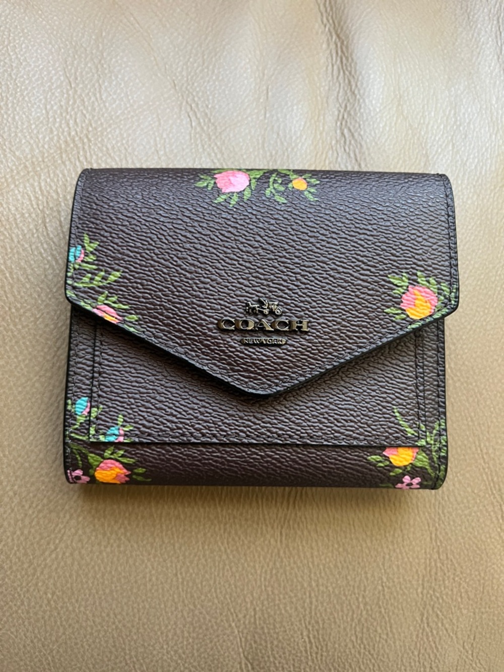 Coach Brown Floral Compact Wallet with Pink & Yellow Accents